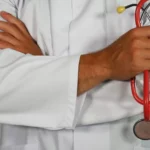 Doctor holding stethoscope