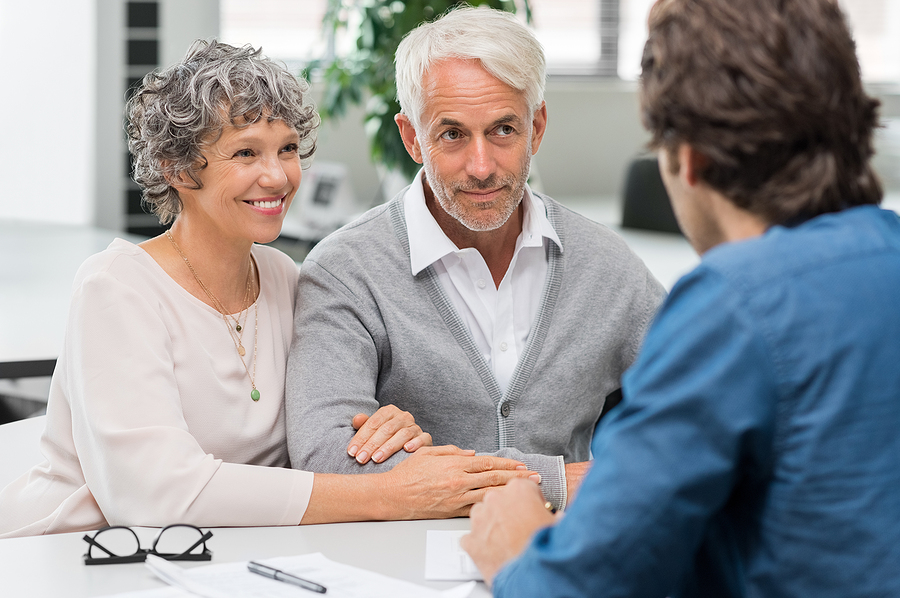 Senior couple meeting real estate agent. Senior couple meeting f